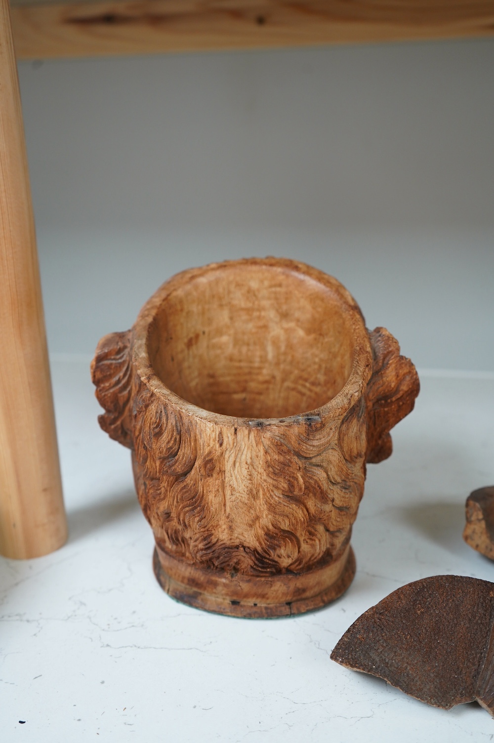 A Black Forest carved ‘terrier’ tobacco jar and cover. Condition - cover poor, jar fair to good